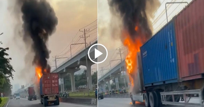 Xe container đang lưu thông bốc cháy nghi ngút (ảnh cắt từ clip).