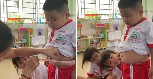 Bé trai nín thở hóp bụng khi cô kiểm tra vòng 2 sau Tết
