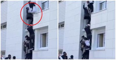 Video bé 6 tháng tuổi sống sót sau khi bị thả từ đám cháy lớn trên tầng 3