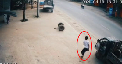 Video: Thấy bánh xe trôi, tài xế nhanh trí ‘song phi’ cứu người đi đường