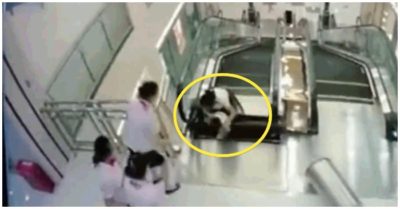 Khoảnh khắc mẹ kịp cứu con trai trước khi bị thang cuốn ‘nuốt’ vào trong