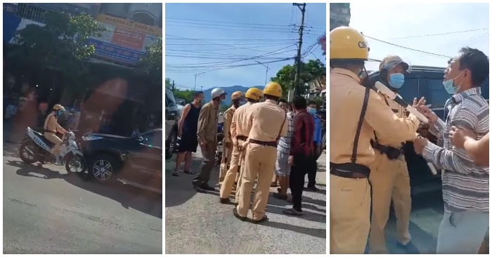 Tài xế ô tô lùi xe trốn cảnh sát giao thông trên Quốc lộ 1 (ảnh chụp từ video).
